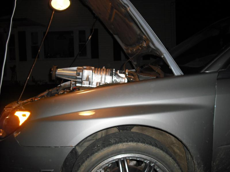 Illustration for article titled Garage Mechanic Ghetto-Rigs Subaru Impreza With Eaton Supercharger